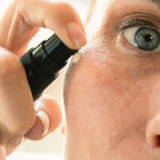 Person applying Aureterra cream to her face